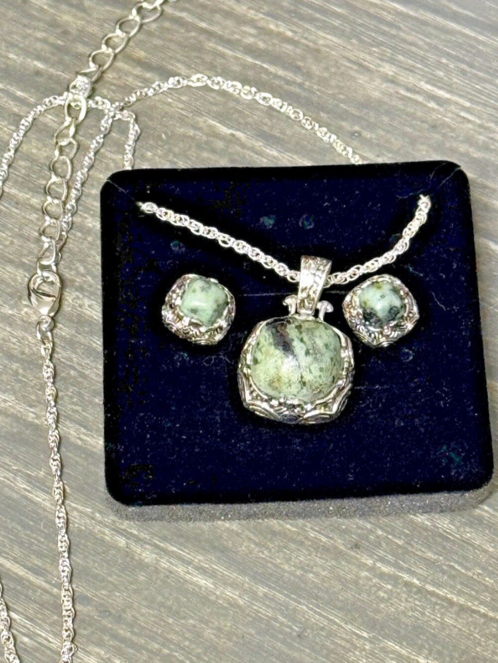 This jewelry set, featuring sterling silver and green jasper stones